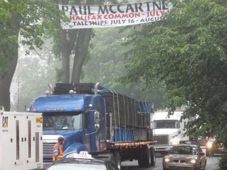 Even the cute Beatle needed flat-bed trucks to get concert gear to the Commons.